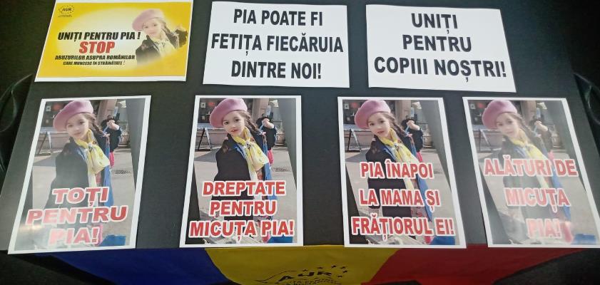 AUR mai sparge un tabu: protestează în fața Ambasadei Germaniei pentru micuța Pia, o copilă româncă luată cu forța de serviciile sociale din Freiburg